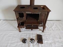 ANCIEN JOUET Gazinière Cuisinière en FONTE GODIN & Cie Bte S. G. D. G. Début XXème