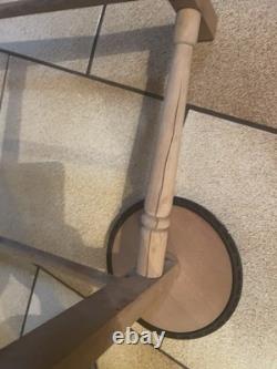 Ancien berceau sur roues en rotin