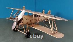 Ancien jouet avion Biplan en tôle 40cmx30cm