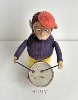Ancien jouet mécanique automate tôle singe musicien tambour Shuco Germany 1930