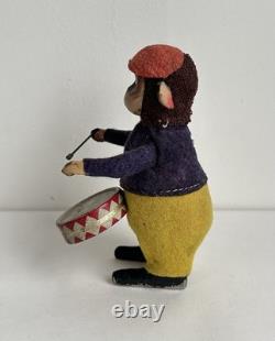 Ancien jouet mécanique automate tôle singe musicien tambour Shuco Germany 1930