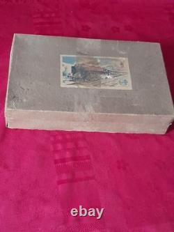 Ancien petit train en tôle avec circuit et boite d'origine distler germany