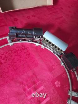Ancien petit train en tôle avec circuit et boite d'origine distler germany