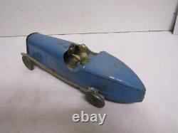 Ancienne voiture en tole de course