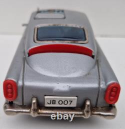 Aston Martin James Bond 007 ASC Aoshin jouet ancien en tôle