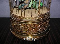 Automate cage à oiseaux siffleur en métal doré de la maison Bontems 3 oiseaux