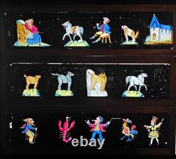 Boite de 12 grandes plaques peintes de lanterne magique 19eme
