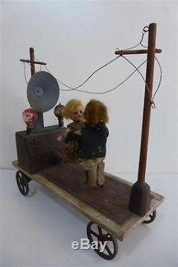 Jouet à trainer Poupées mignonettes valse bal Balèti TSF radio électricité 1900