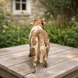 Jouet ancien mécanique Vache à lait sur roulettes, fin XIXe siècle