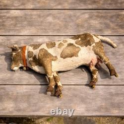 Jouet ancien mécanique Vache à lait sur roulettes, fin XIXe siècle