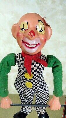 Jouet tôle mécanique ancien Jimmy clown trapéziste. Arnold. Années 1930-1950