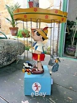 Manege caroussel musical pinocchio disney windup carousel music box