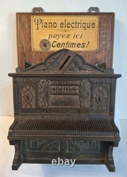 Piano électrique monnayeur Art forain fonte de fer rare centimes limonaire