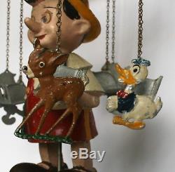Pinocchio Windup carousel music box Jouets Creation, France 1950s RARE TOY