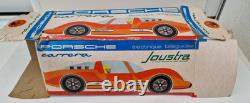 Porsche Carrera bleu en boite d'origine Joustra jouet ancien en tôle