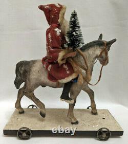 Rarissine Pere Noel ancien sur son cheval jouet a tirer Santa Claus on horse