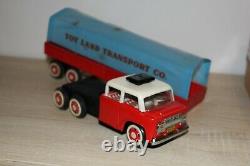 Red china tin toy friction covered truck