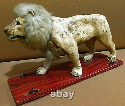 Sublime automate Victorien jouet ancien Lion tete hochante jouet a tirer 40cm